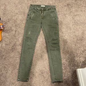 Hip rise olive green skinny jeans